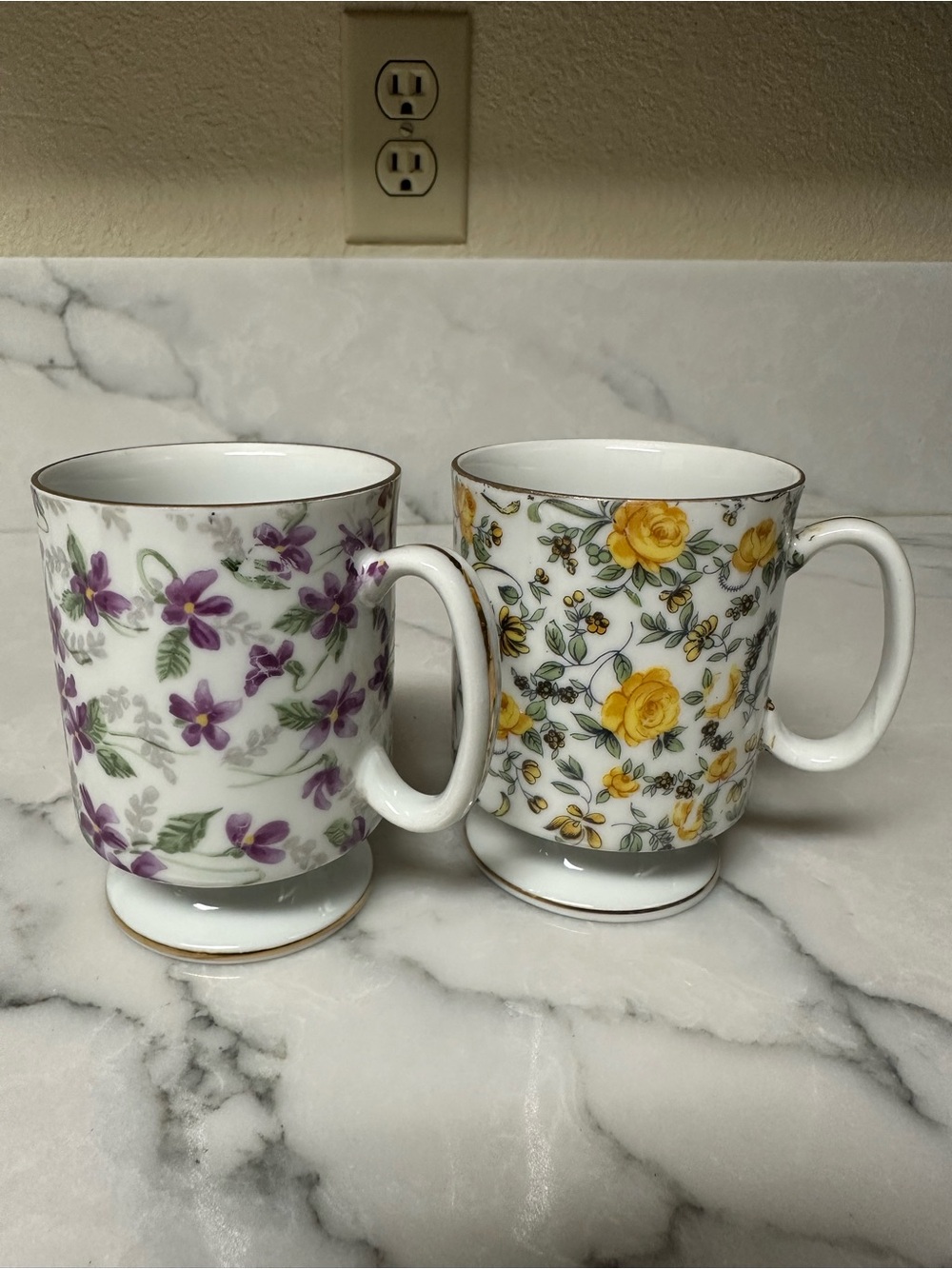 two vintage footed porcelain coffee mugs